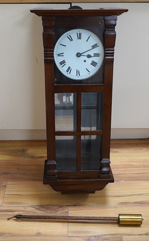 An early 20th century mahogany cased fusee wall timepiece, 84cm high. Condition - fair to good, unchecked if working